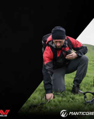 man_kneeling_grass_metal_detector.webp